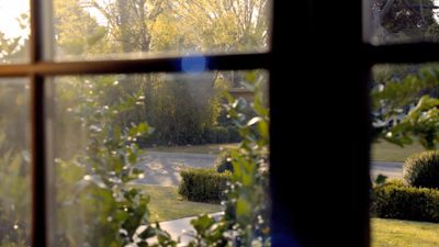 a view of a street through a window