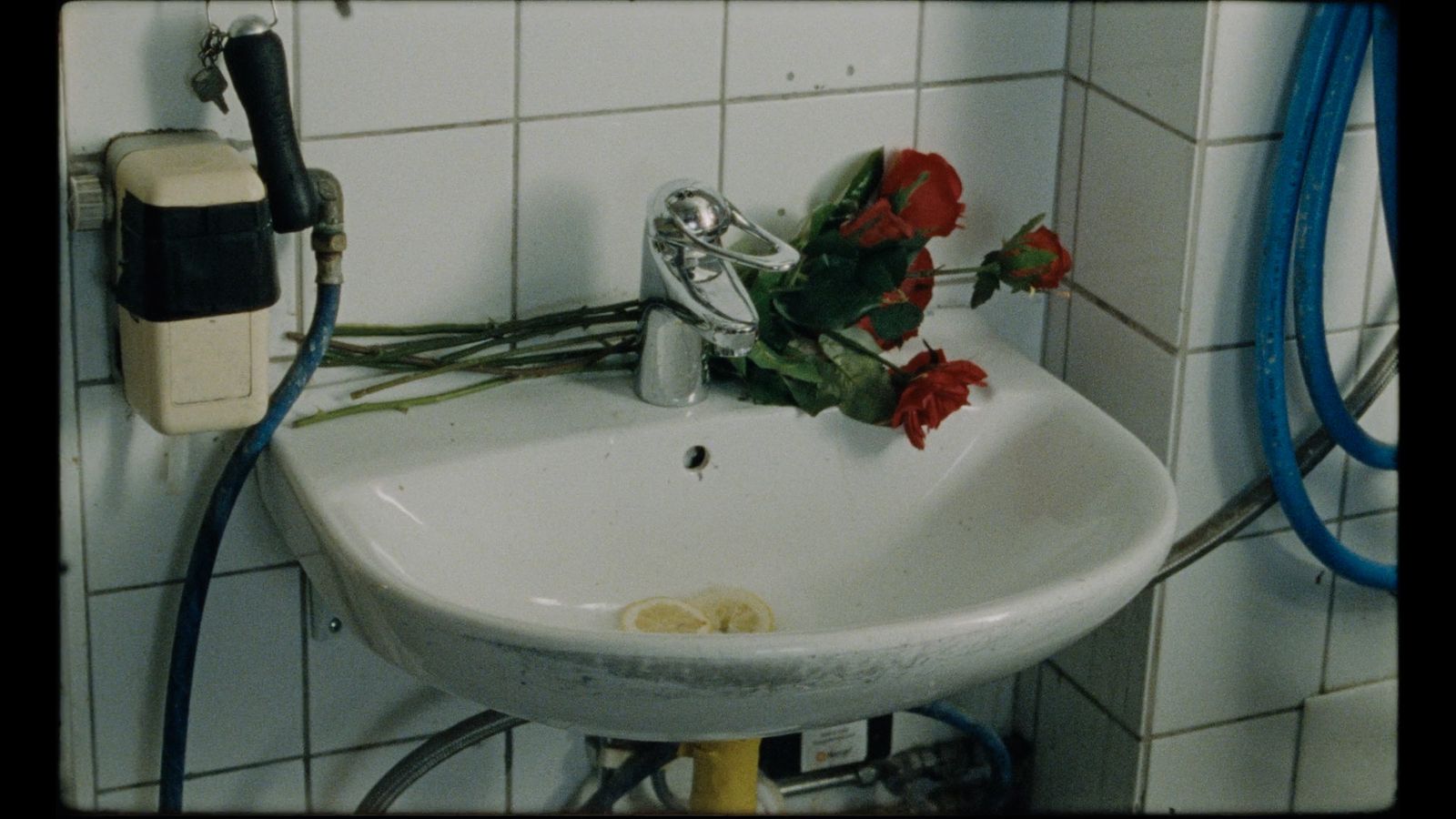 a sink with a bunch of flowers in it