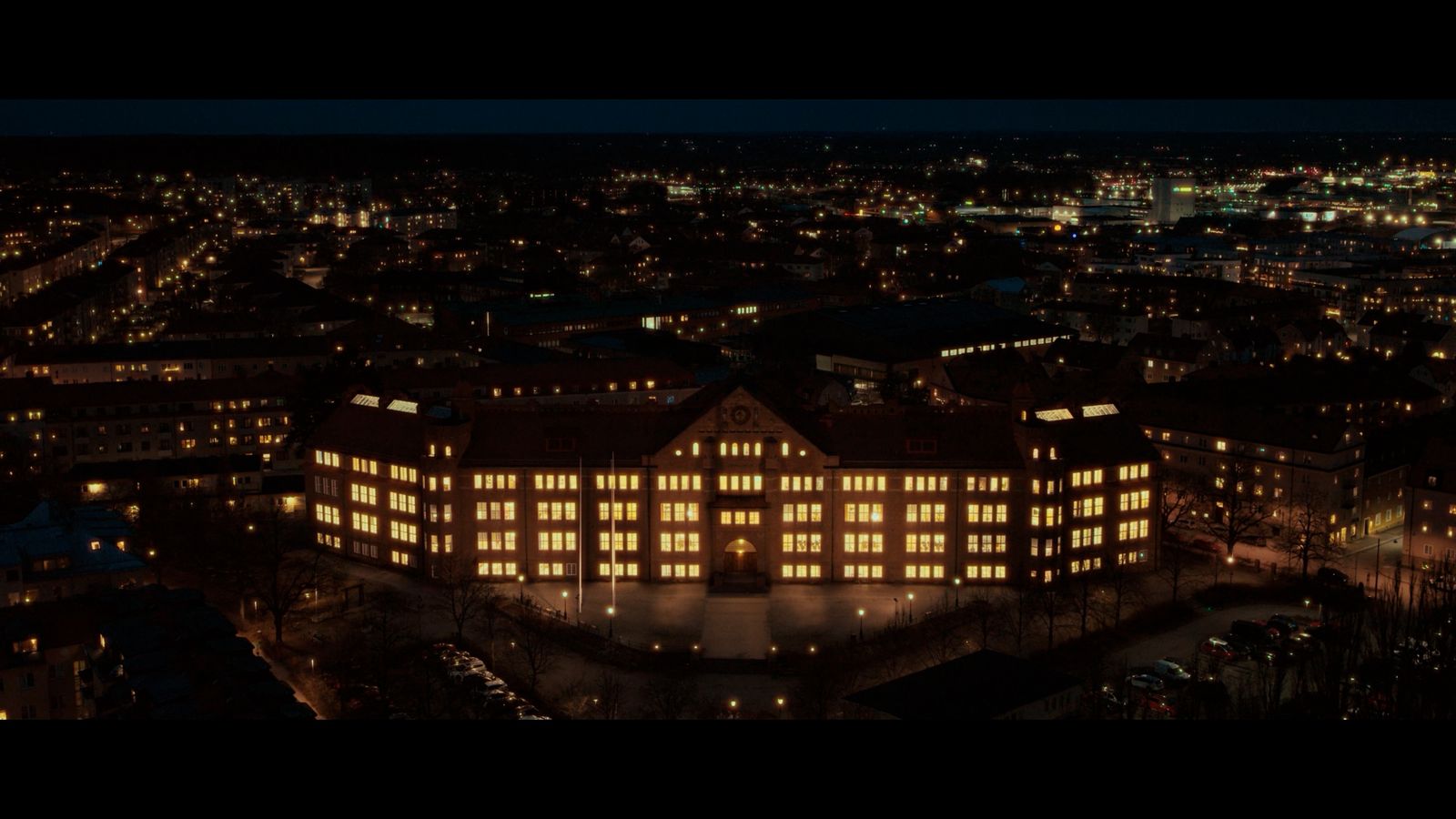 an aerial view of a city at night