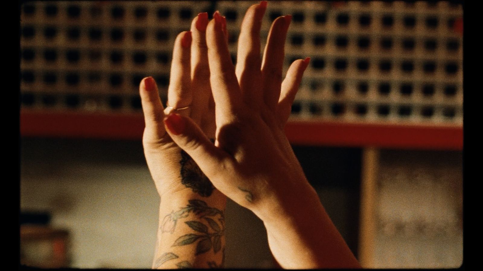 a woman's hand with a tattoo on it