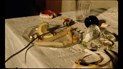 a plate of food on a table with a knife and fork