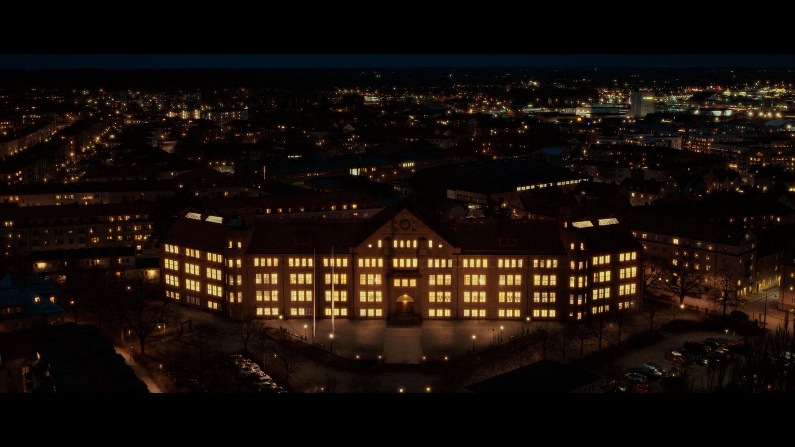 an aerial view of a city at night