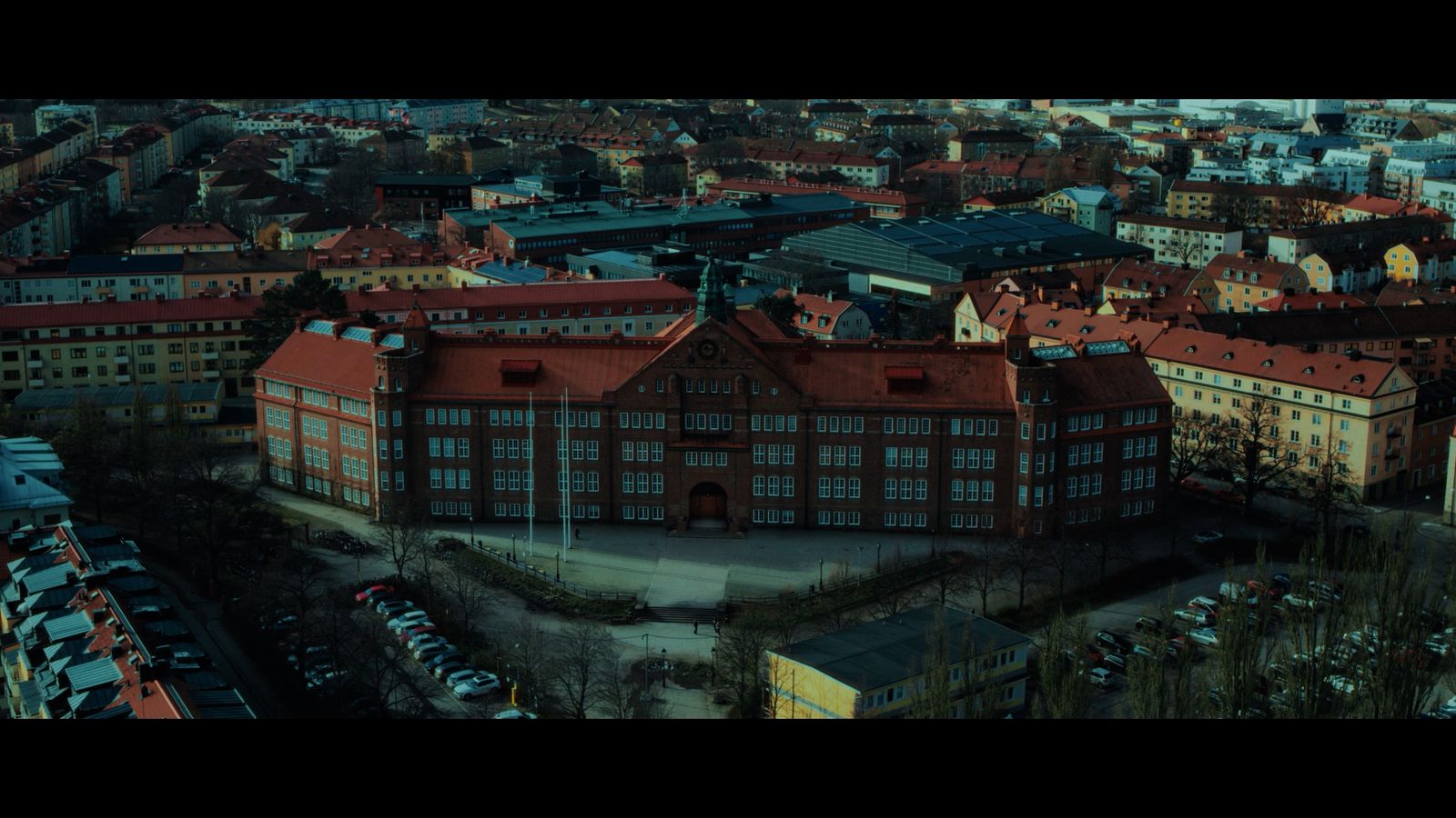 an aerial view of a large building in a city