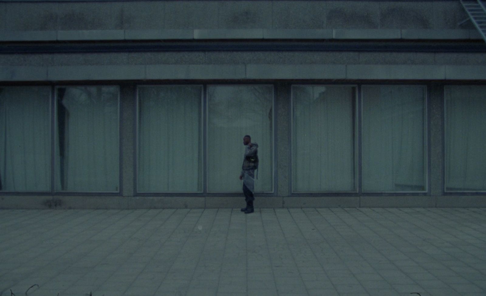 a person standing in front of a building