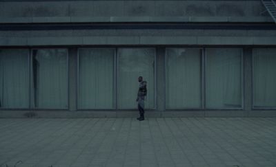 a person standing in front of a building