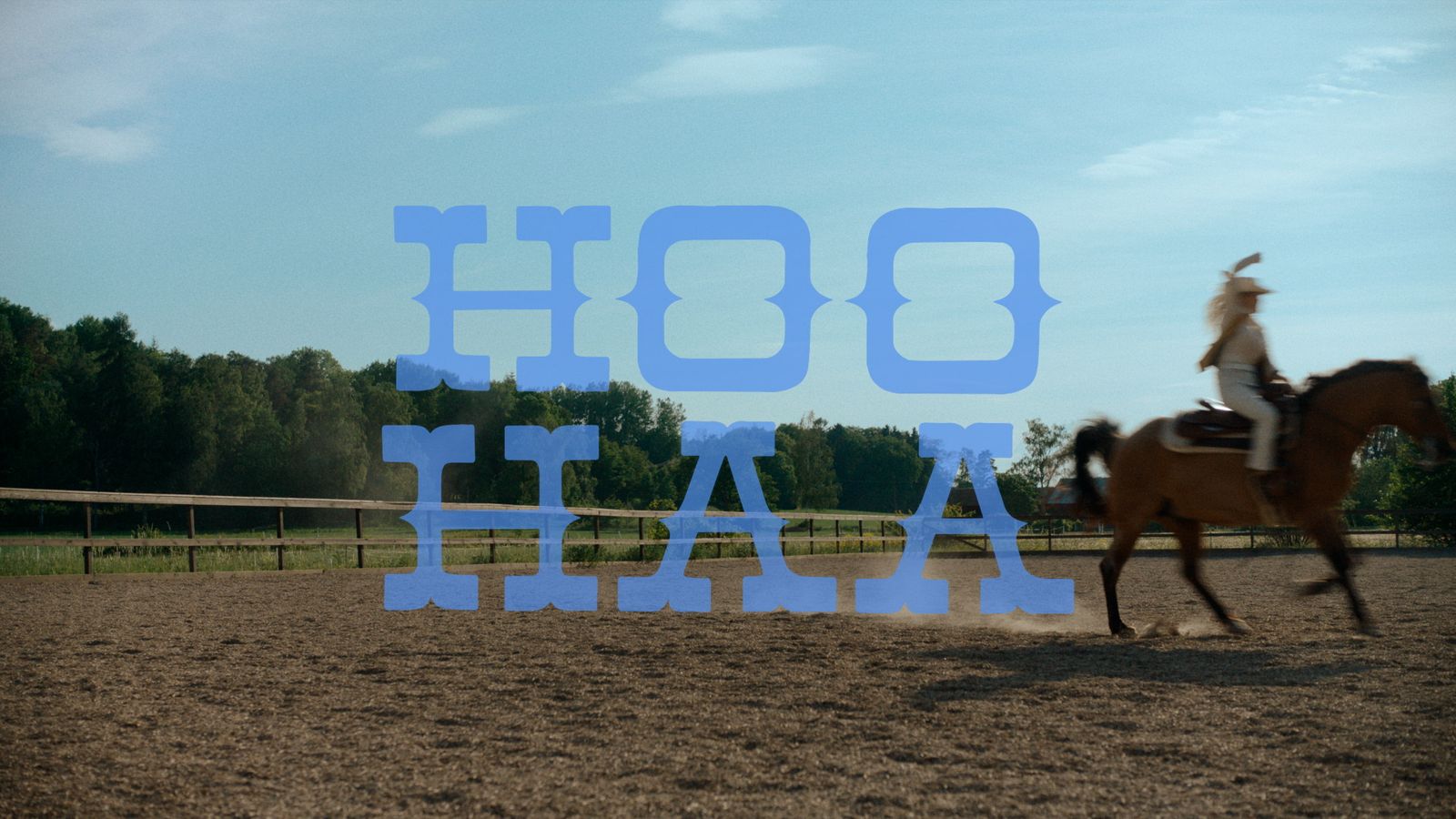 a man riding on the back of a brown horse