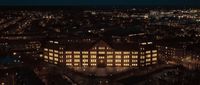 an aerial view of a city at night