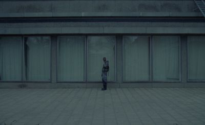 a person standing in front of a building