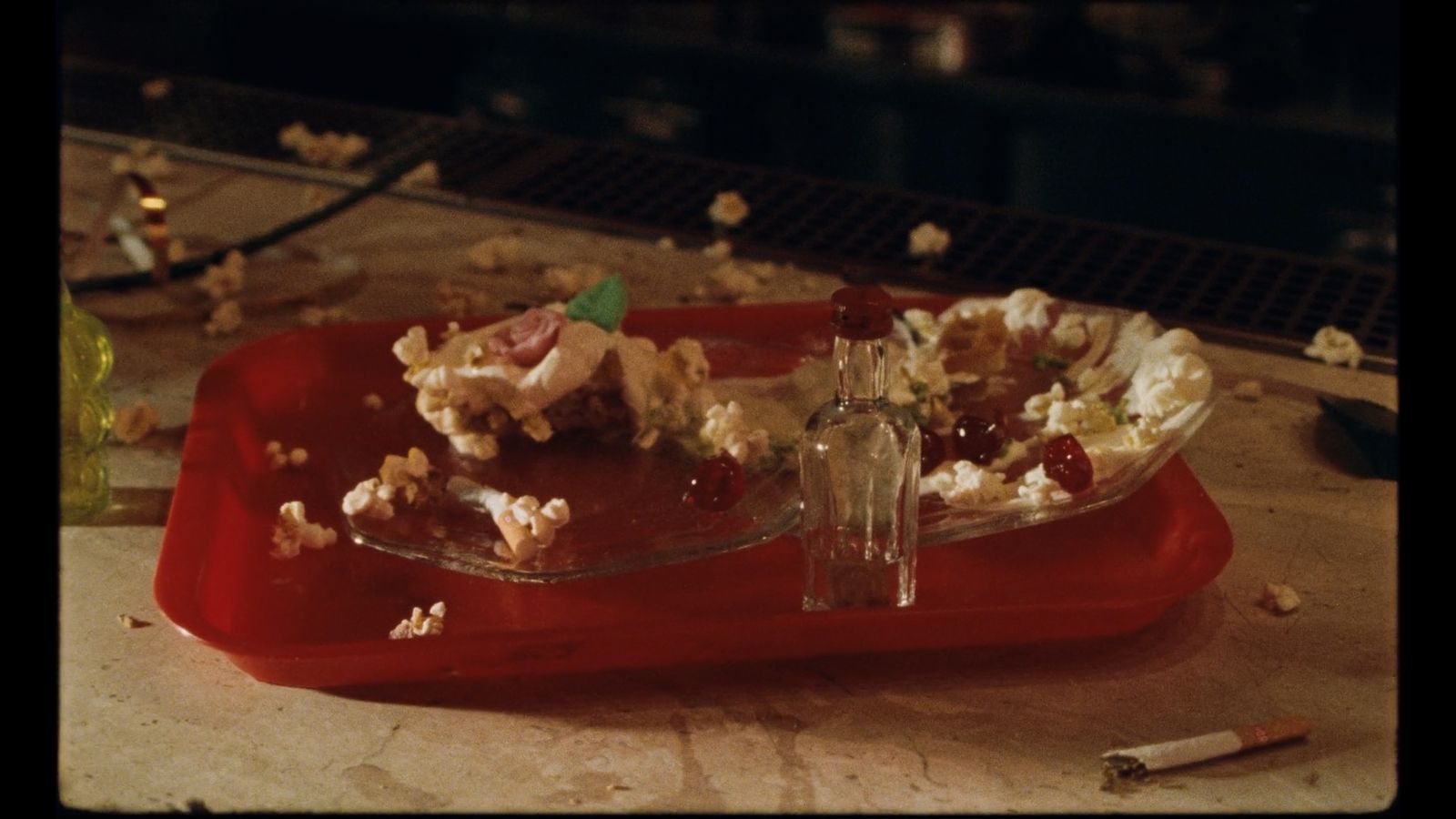 a red tray with a piece of cake on it