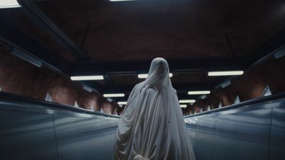 a statue of a woman wearing a white veil