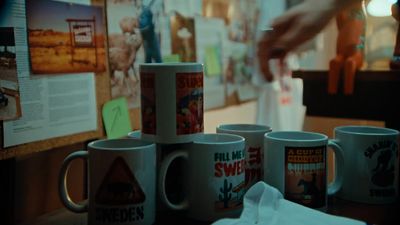 a stack of coffee mugs sitting on top of a table