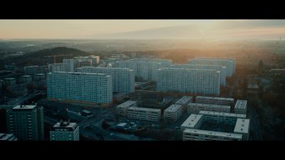 an aerial view of a city with tall buildings