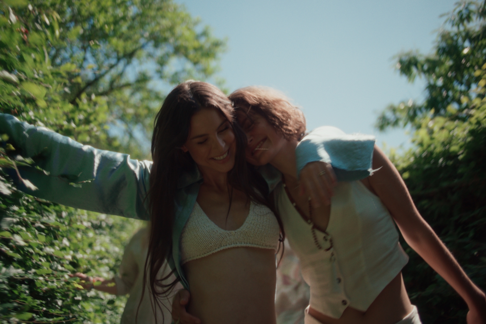 two young women are posing for a picture