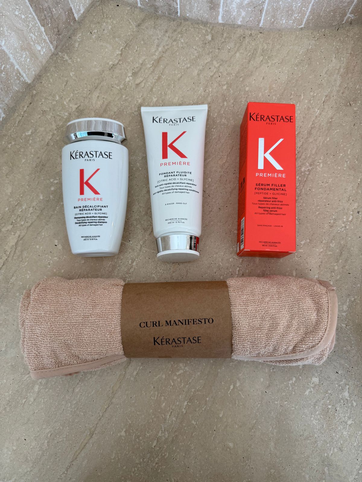 the contents of a personal care kit laid out on the floor