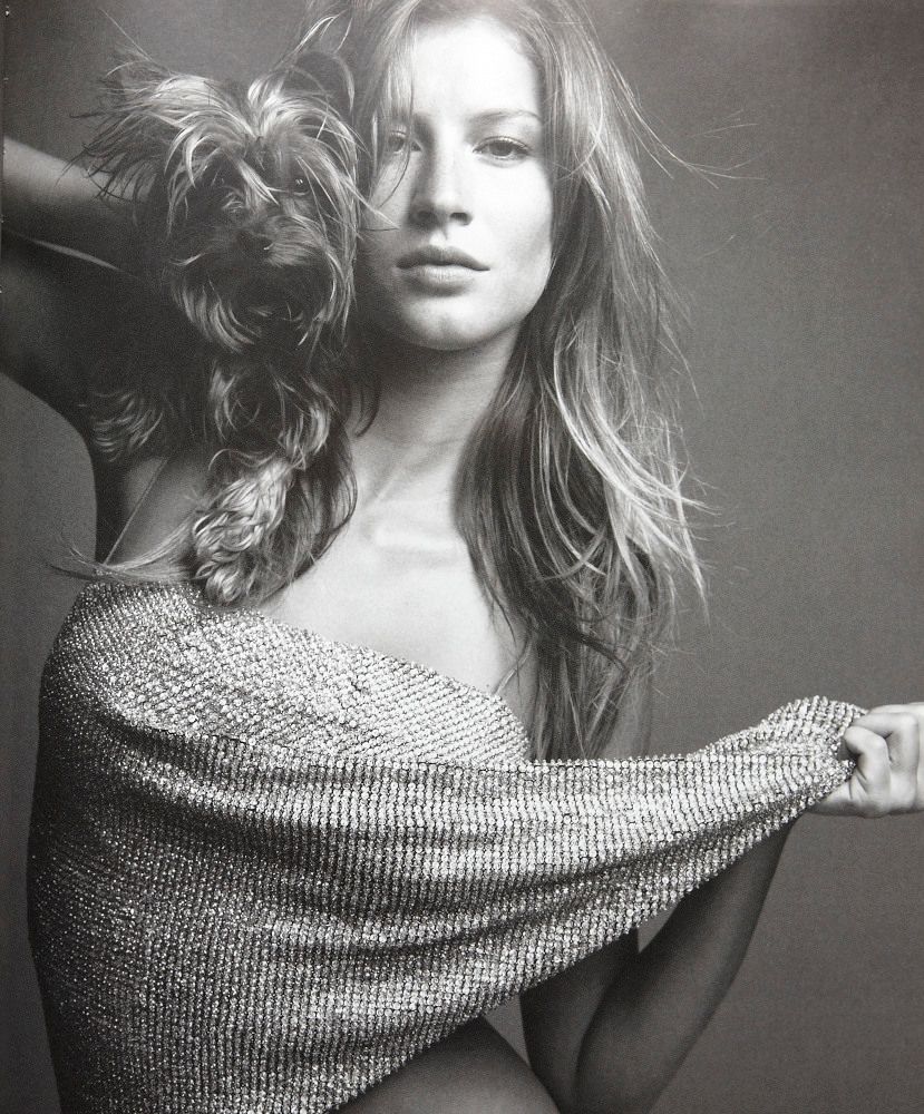 a black and white photo of a woman with long hair