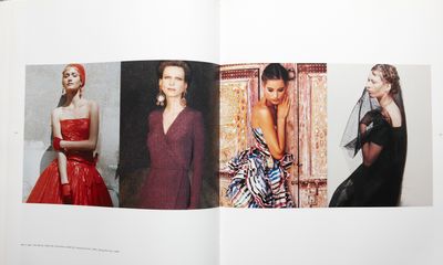 a book with pictures of women in dresses