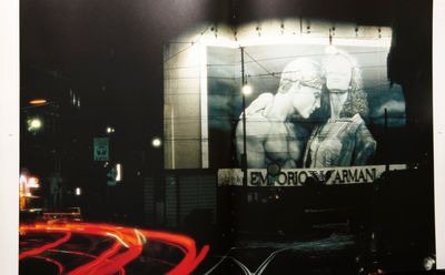 a large picture of a man and woman on a building