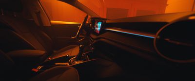 the interior of a car with the sun shining through the window