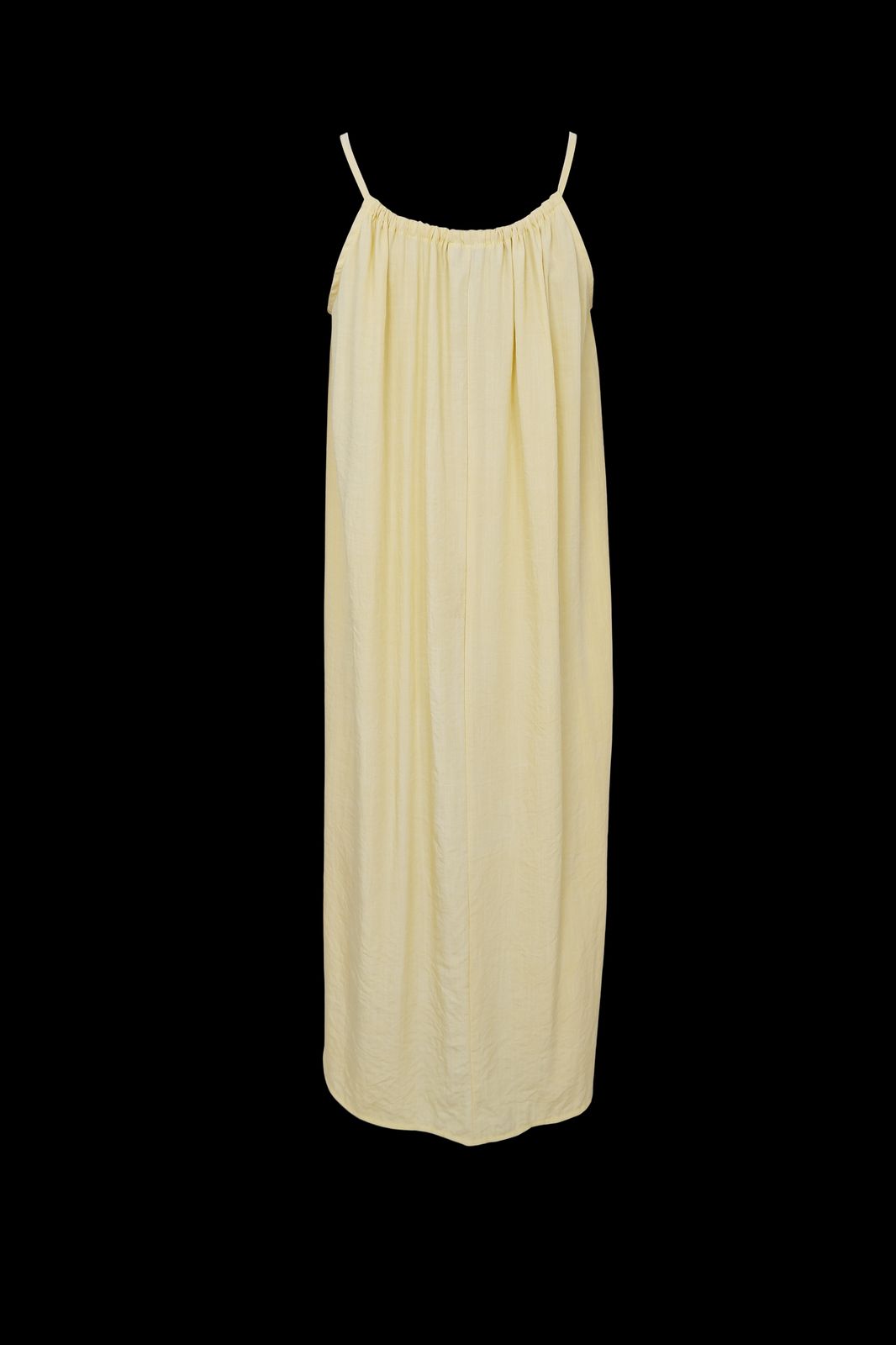 a yellow dress on a black background