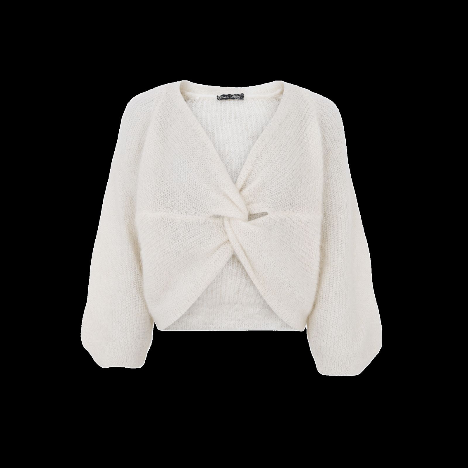 a white sweater with a bow on the front