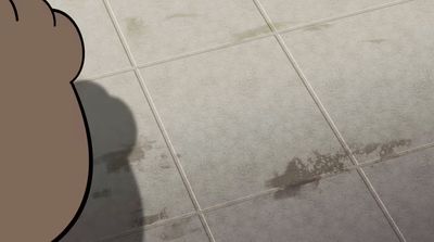 a person standing on a tiled floor next to a wall