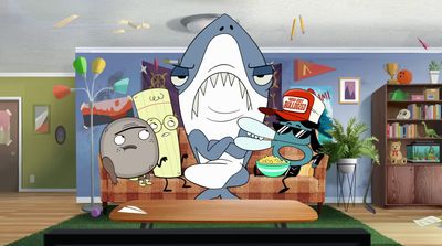 a living room with a cartoon shark on the wall