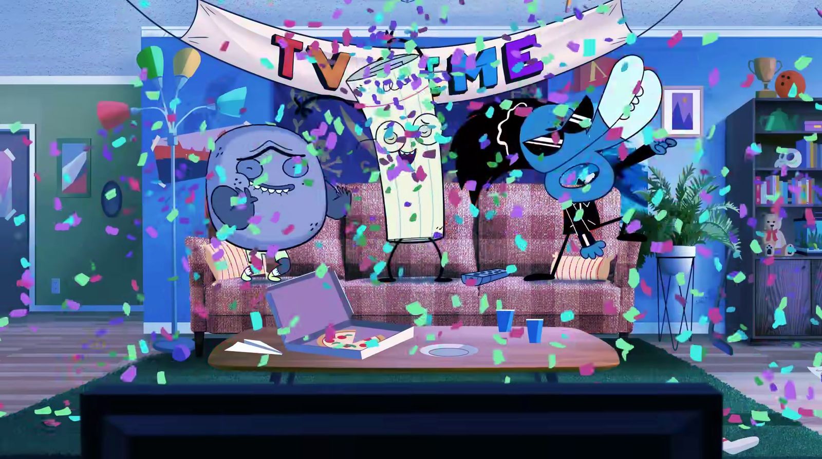 a living room filled with furniture and confetti