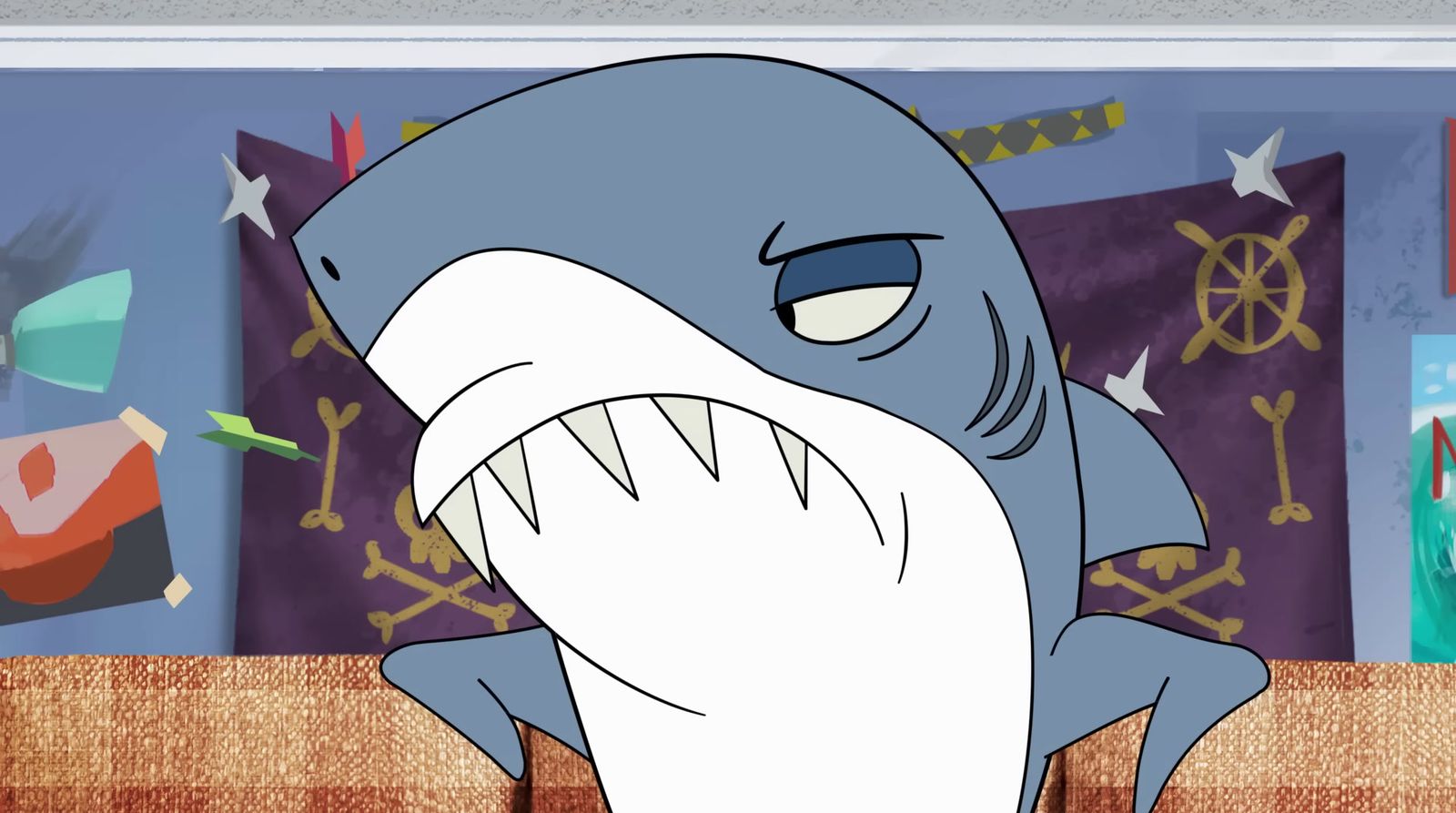 a cartoon picture of a shark with its mouth open