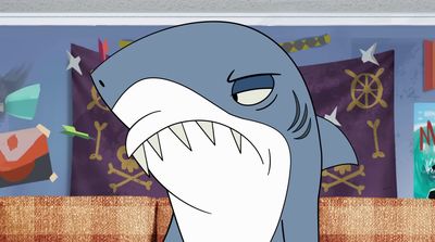 a cartoon picture of a shark with its mouth open