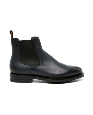 a pair of black leather chelsea boots