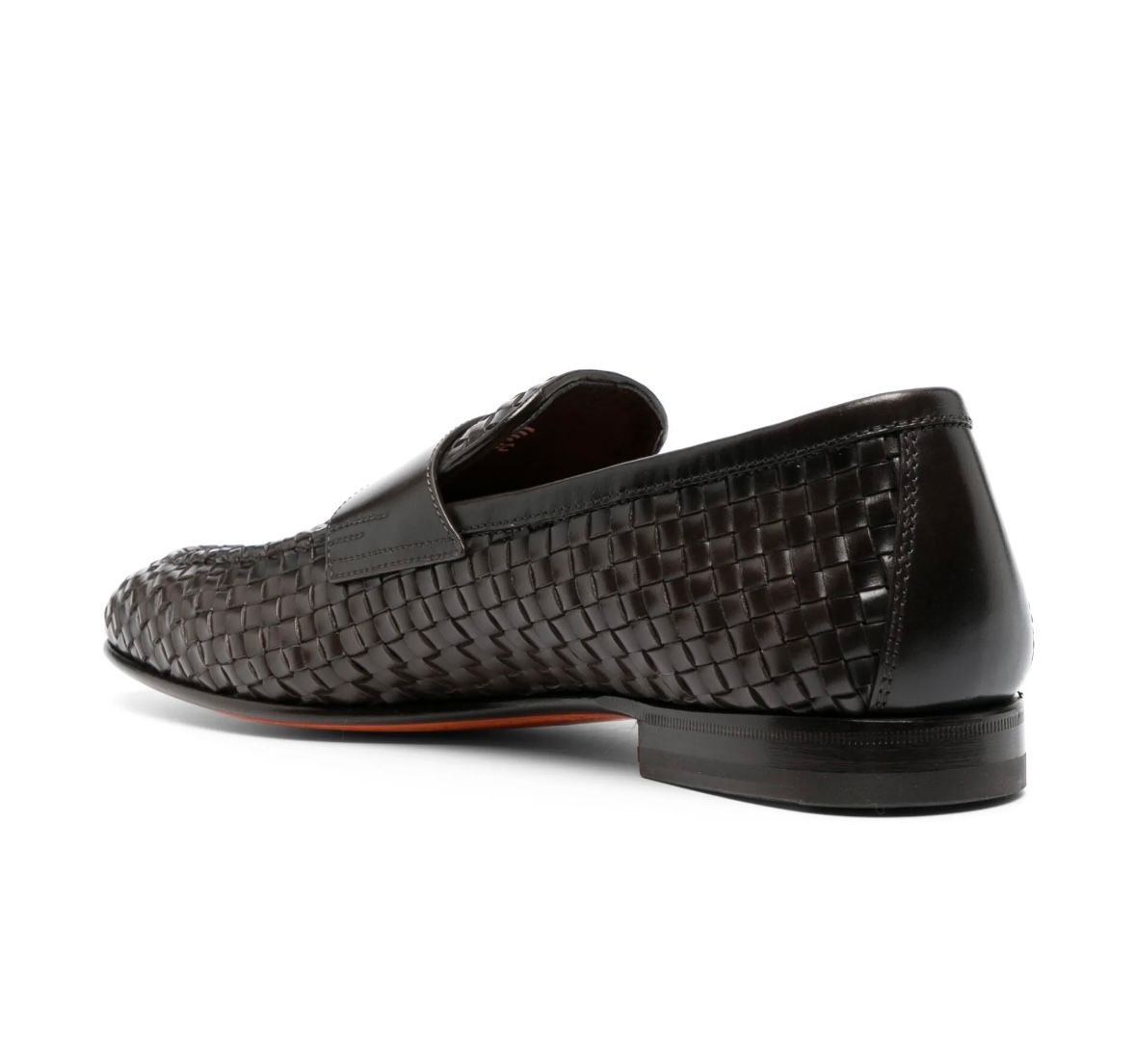 a black loafer with a woven pattern on the side