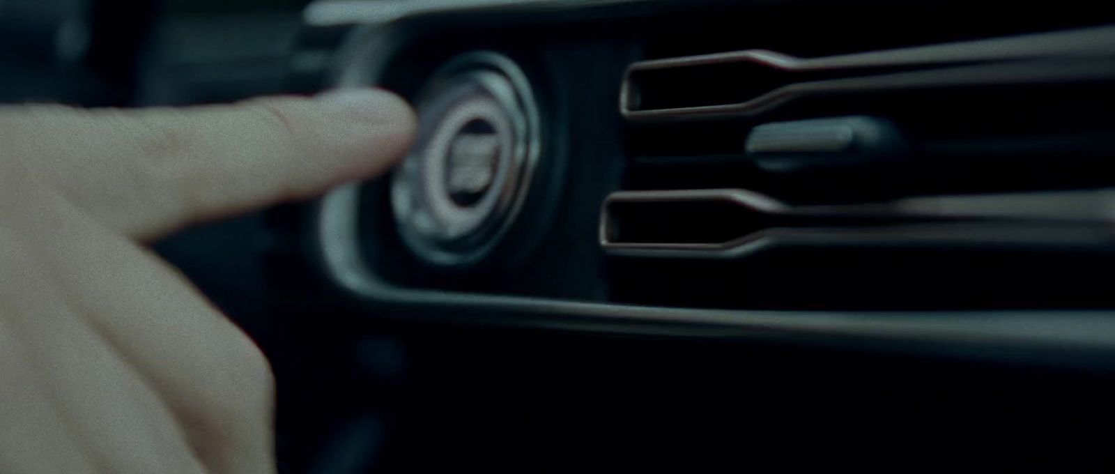 a close up of a person driving a car