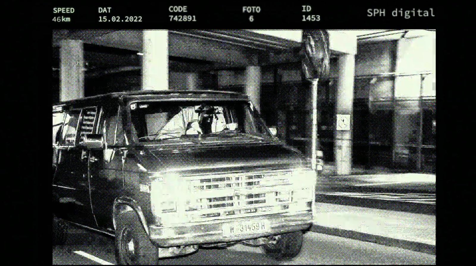 a black and white photo of an old truck