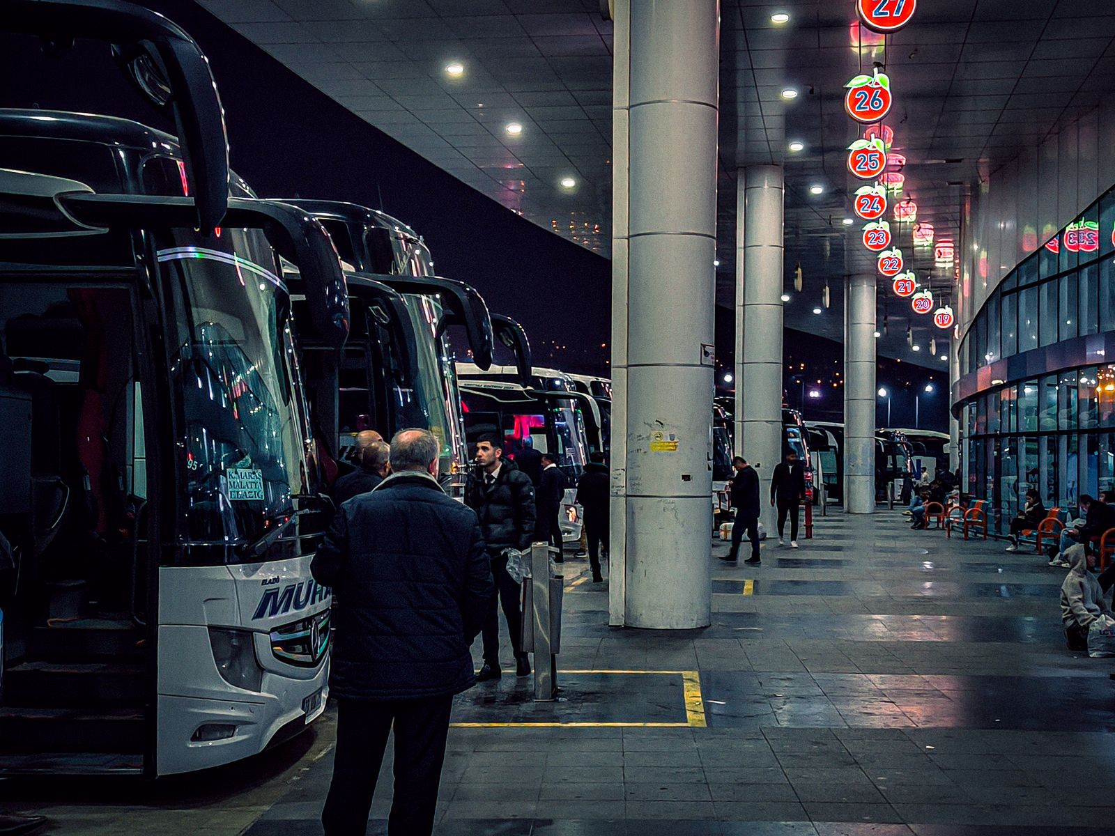 a group of buses parked next to each other