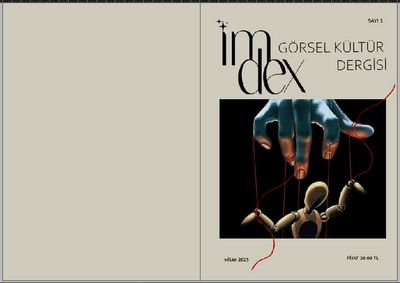 a magazine cover with a hand reaching out of it