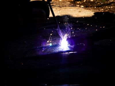 a person holding a lighter in their hand