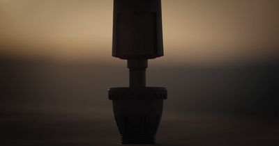 a black and white photo of a light bulb