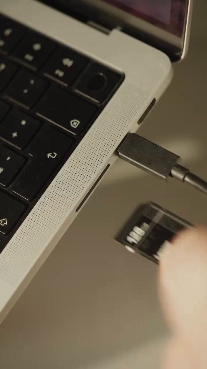 a close up of a person using a laptop computer