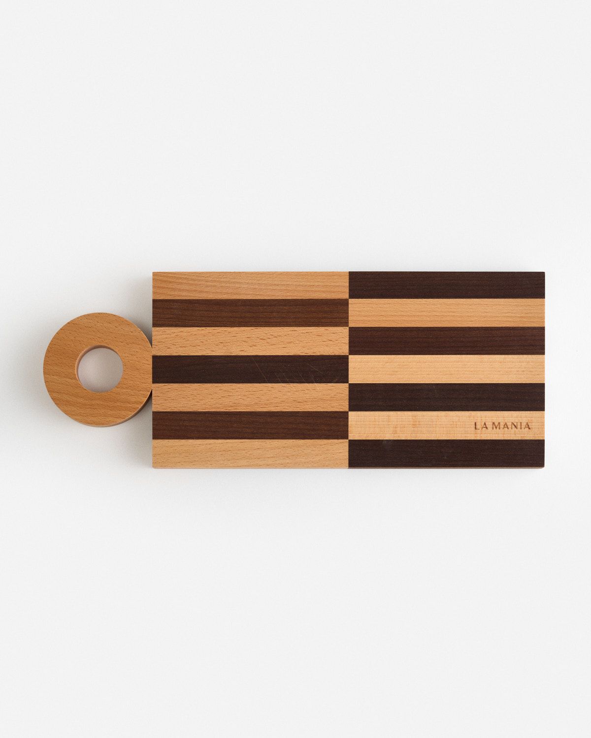 a wooden cutting board with a roll of tape