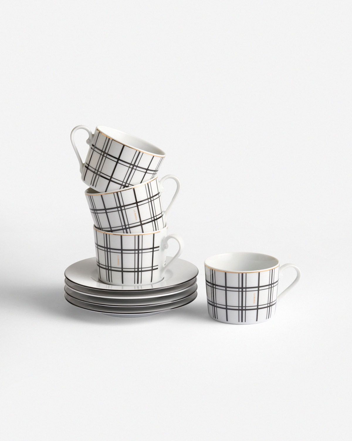 a stack of four cups sitting on top of each other