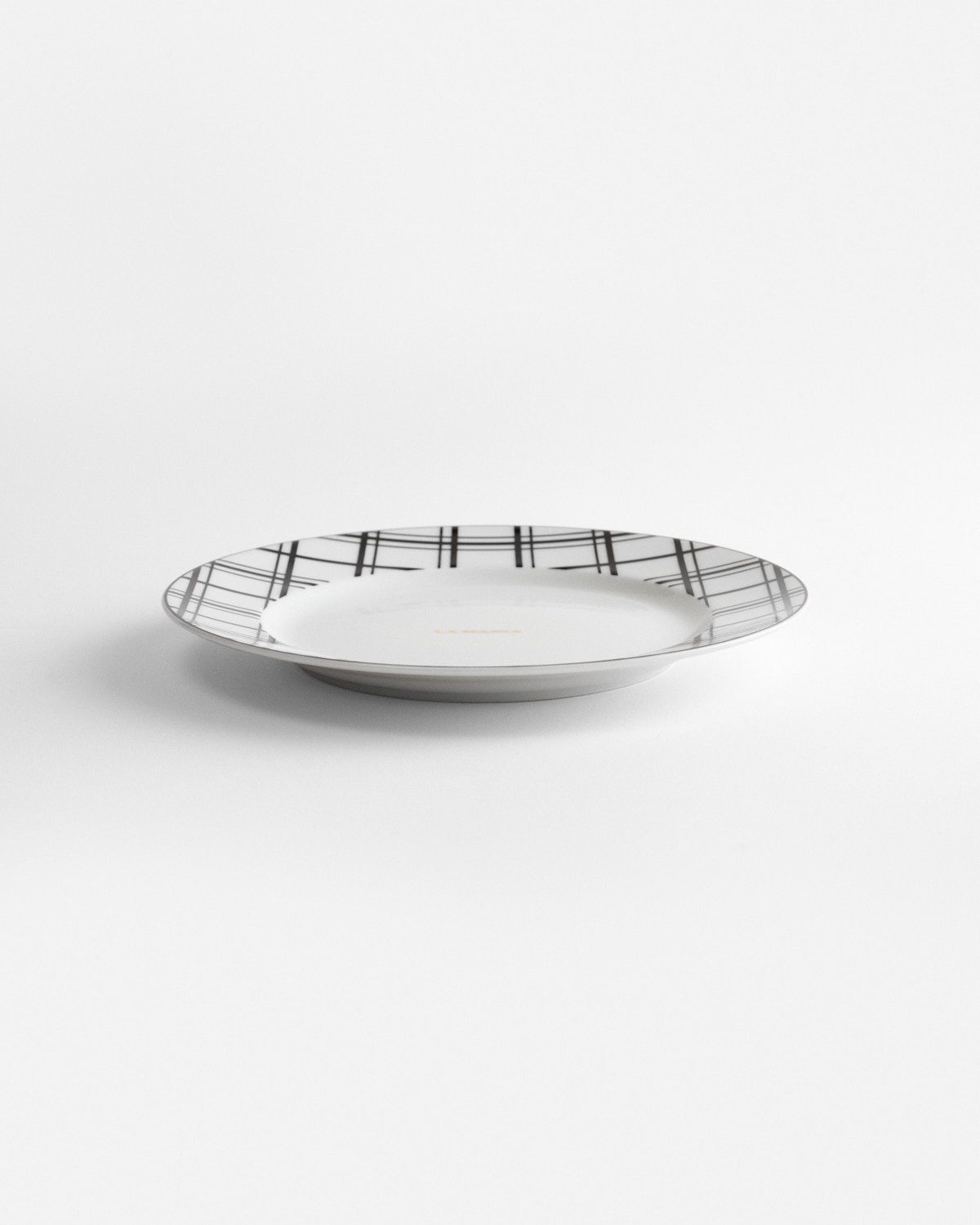 a white plate with black lines on it