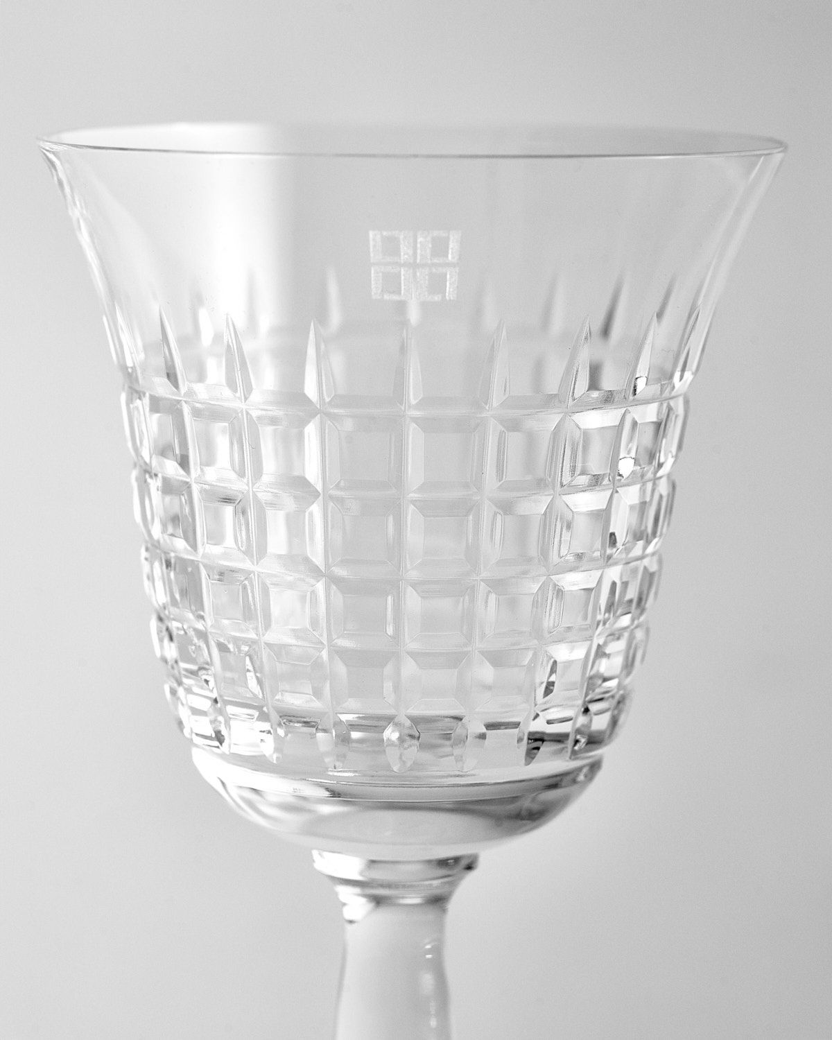 a clear glass vase sitting on top of a table