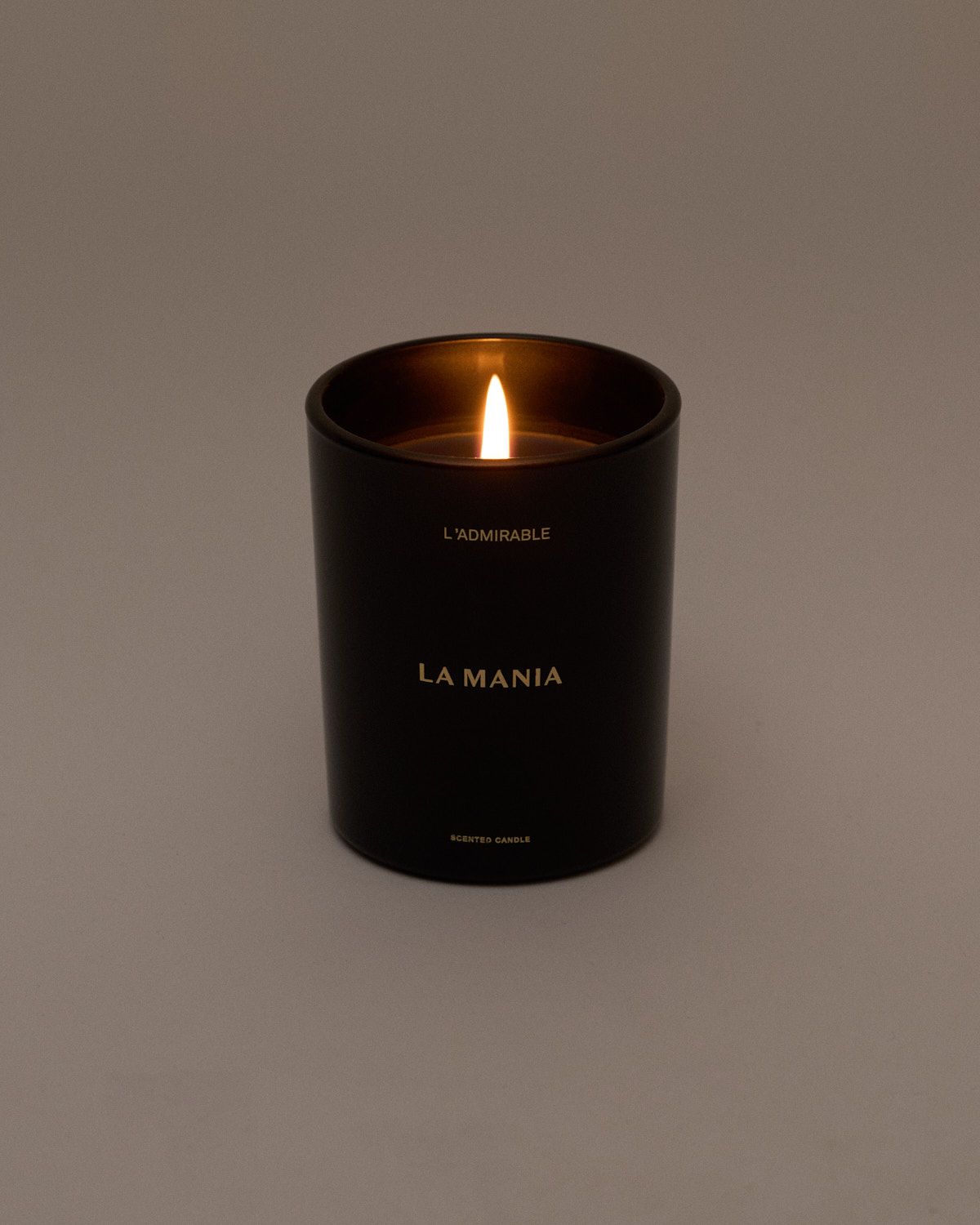a candle that is lit on a table