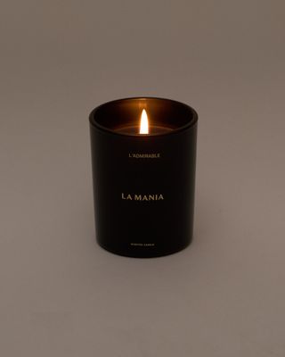 a candle that is lit on a table