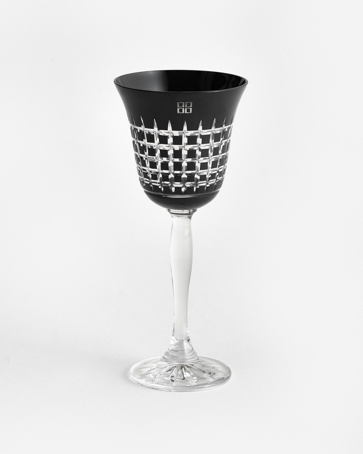 a black and white wine glass on a white background