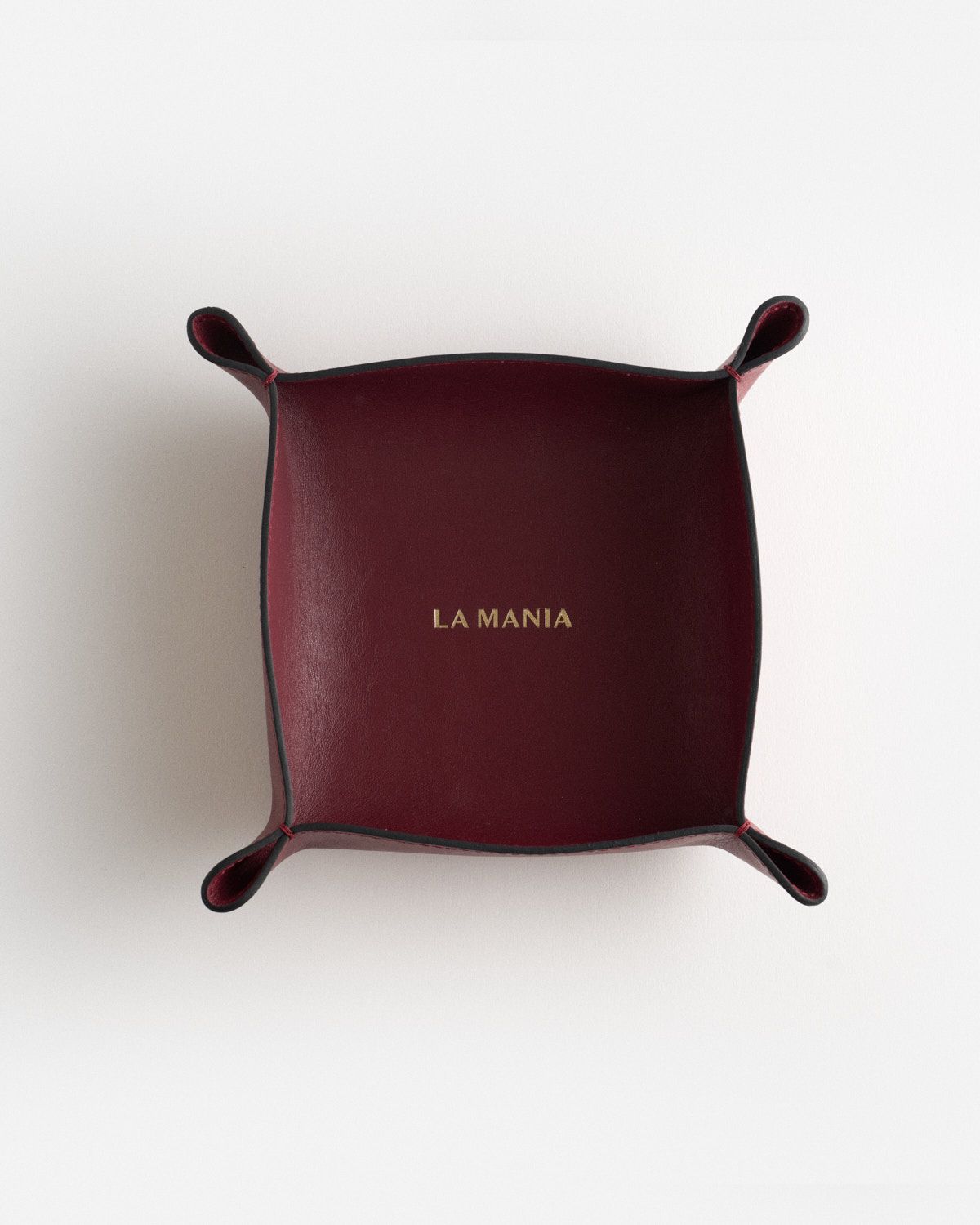 a red tray with a name on it