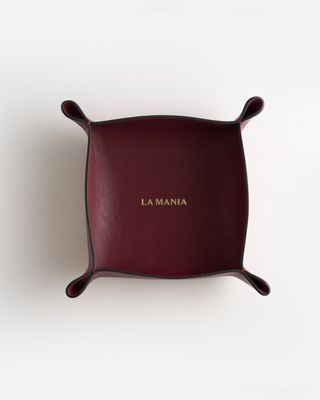 a red tray with a name on it