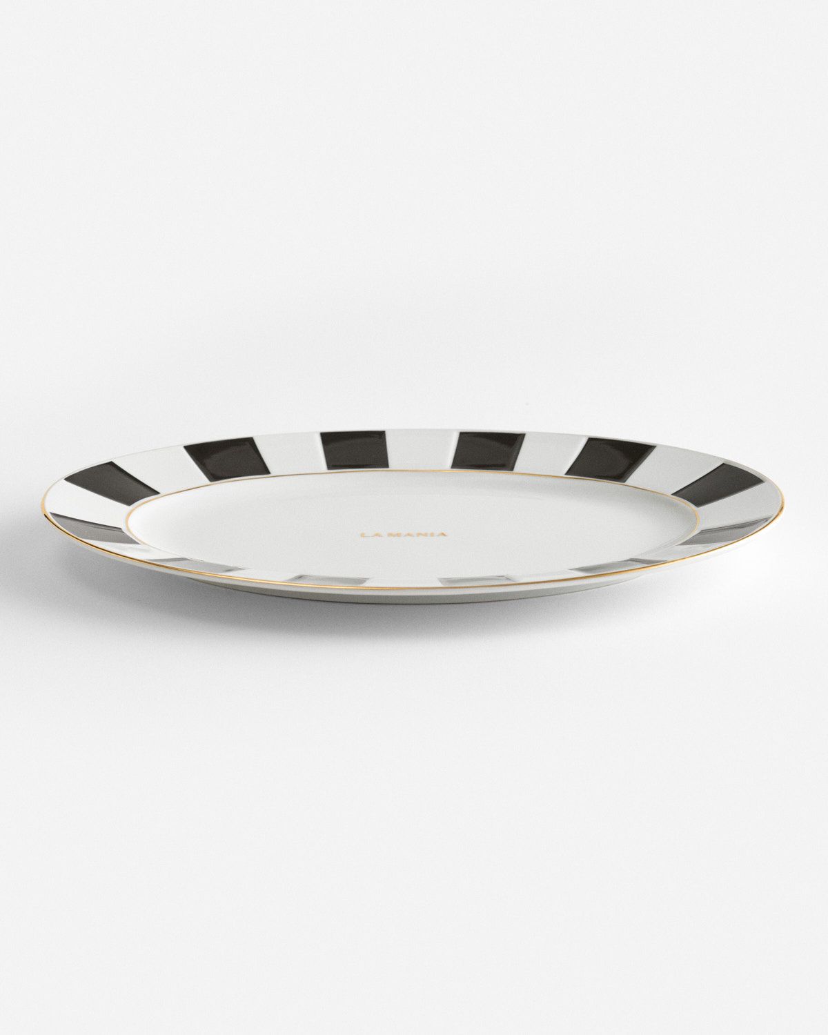 a white plate with black and white stripes
