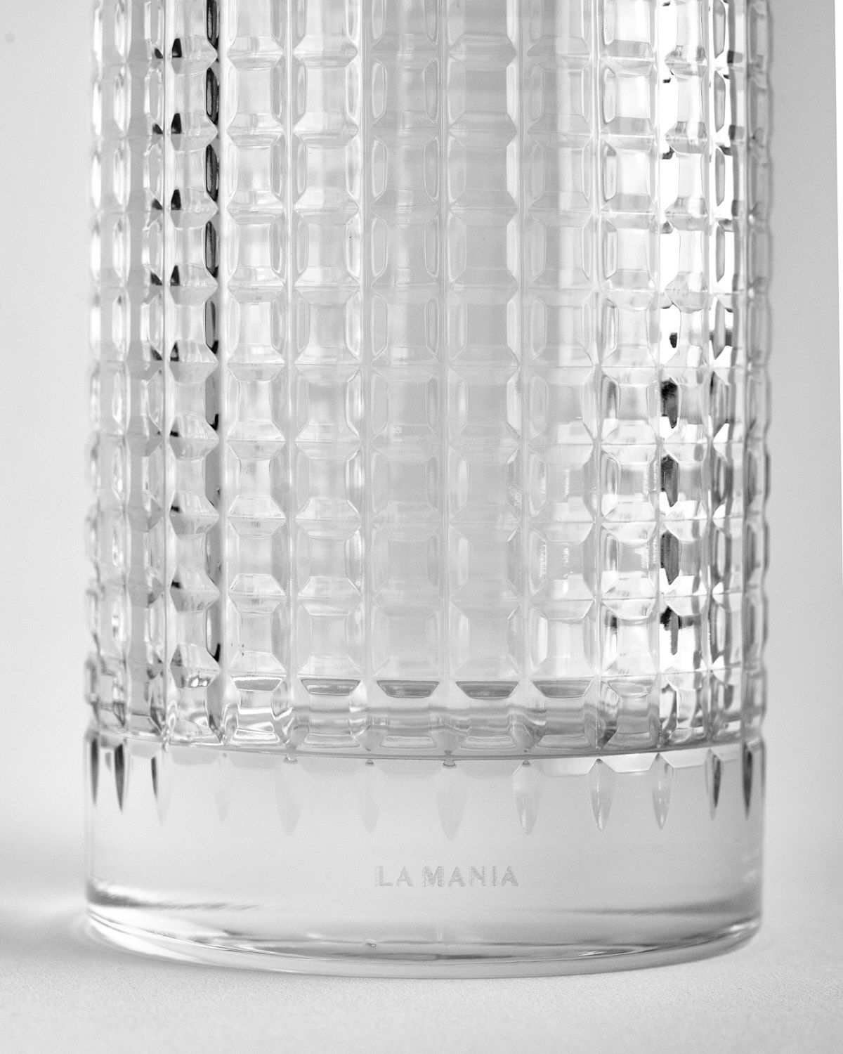 a close up of a glass vase on a table