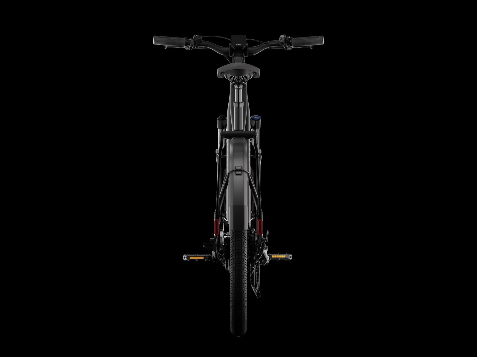 the front of a mountain bike in the dark